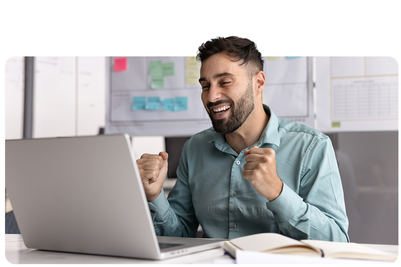 Sales professional typing on a laptop while reviewing scored leads in IgniteDemand Accelerate